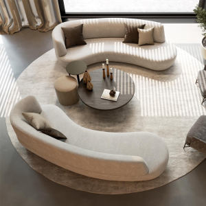 Bank Guiliana van Hofstede Raanhuis met elegante ronde vormen en moderne organische lijnen in neutrale stoffering