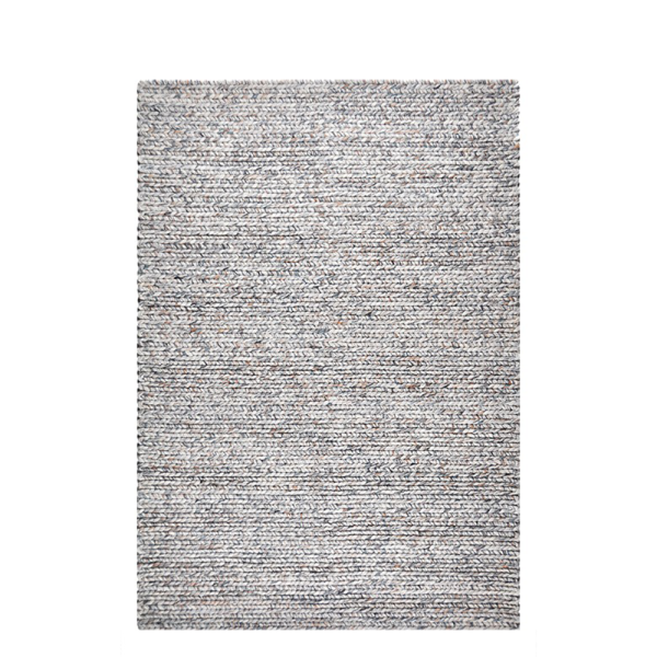 Vloerkleed Etna naturel van Perez met warme tinten en rijk patroon in een sfeervol interieur