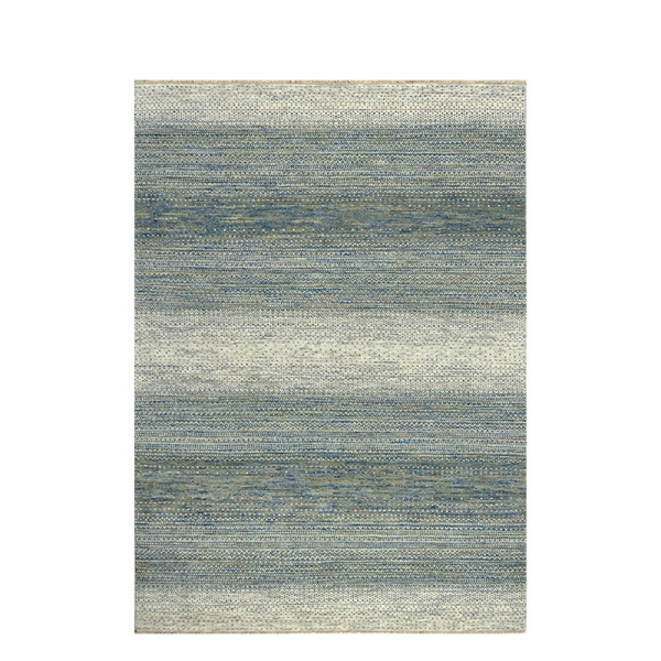 Vloerkleed Lucera ivoor groen van Perez met zachte wolstructuur in een licht en natuurlijk interieur