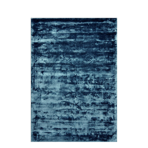 Vloerkleed Flavia terra van Perez met subtiele glans in een warm en luxe interieur