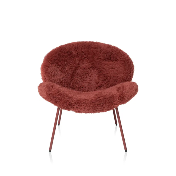 Fauteuil Freddy van COCOmaison met zachte stoffen bekleding en een ton-sur-ton metalen frame.